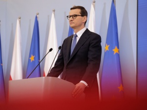Premier: Jeśli zarabiający do 12,8 tys. zł brutto stracą na Polskim Ładzie, będą mogli rozliczyć się jak w 2021 r. 
