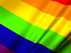 Pomnik św. Jana Pawła II w Szczecinie z flagą LGBT. Radny PiS: "Po co prowokują?"